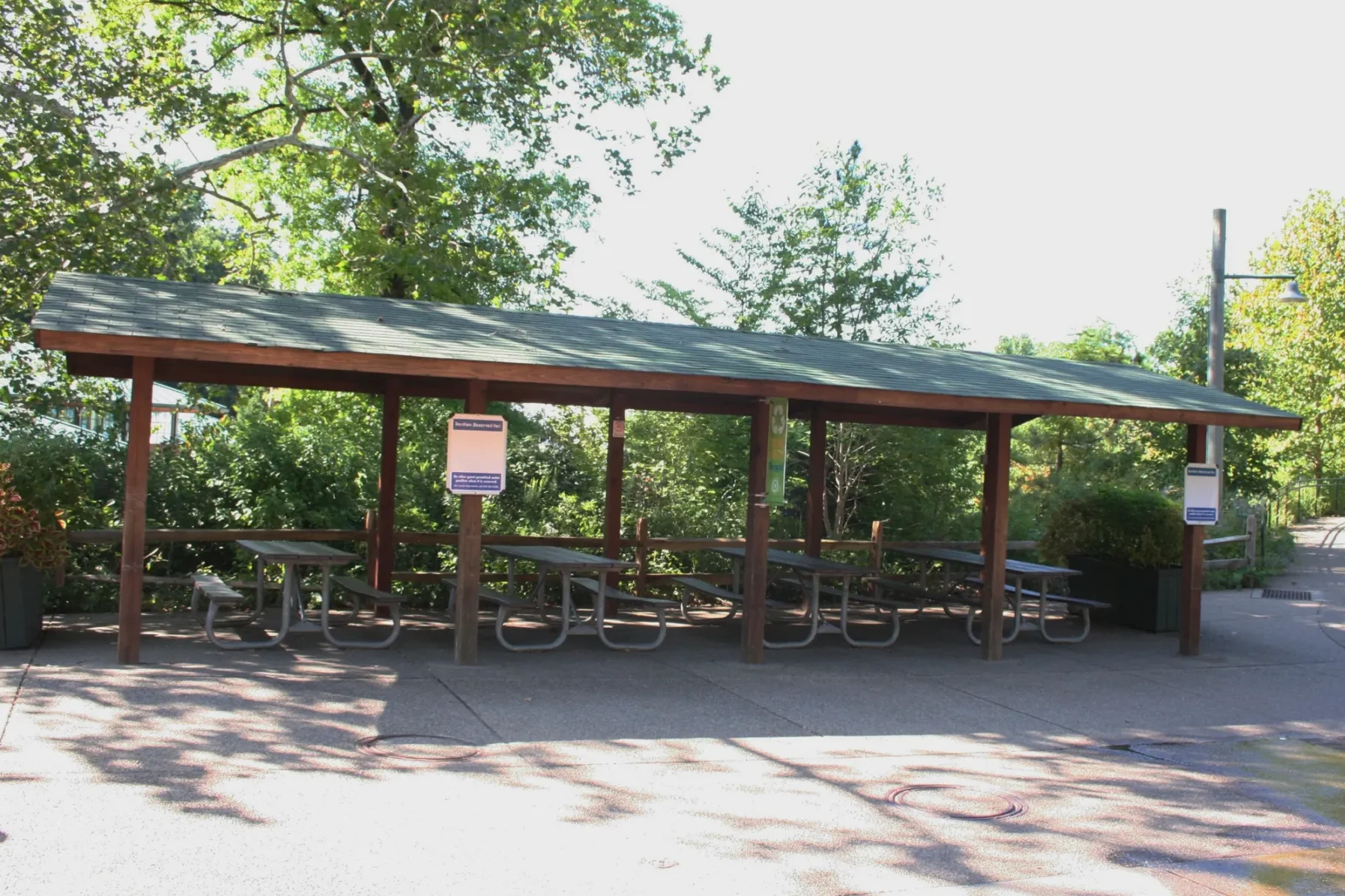 Pittsburgh Zoo Kids Kingdom Pavilion with picnic tables inside.